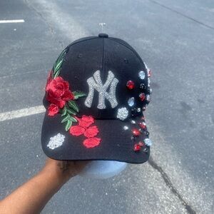 Embellished Black Cap with Red Floral Design